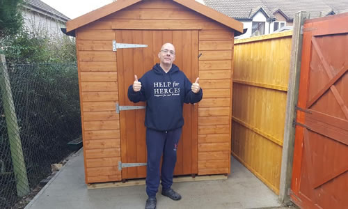 Repaired and painted garden building