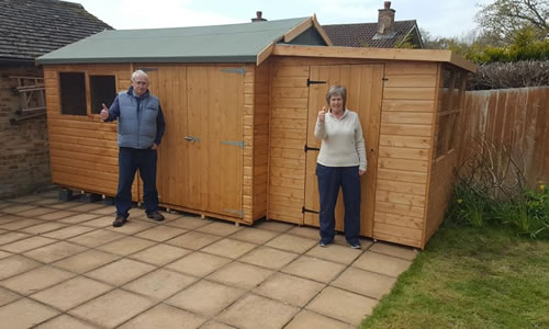 Restored timber shed in a customer's garden